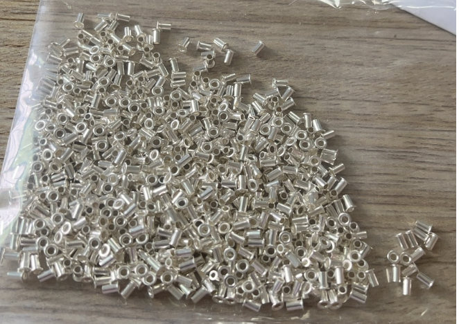 Nuote Metals Sends DIN 7340 A Silver-Plated Brass Rivets Samples to Malaysia for Client Testing